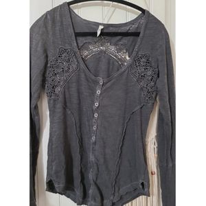 Free people long sleeve cut out top.